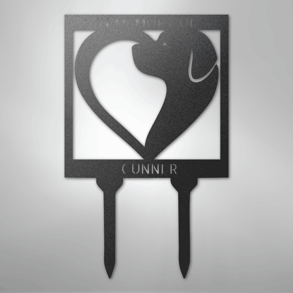 Black metal garden stake with dog and heart design on a gray background