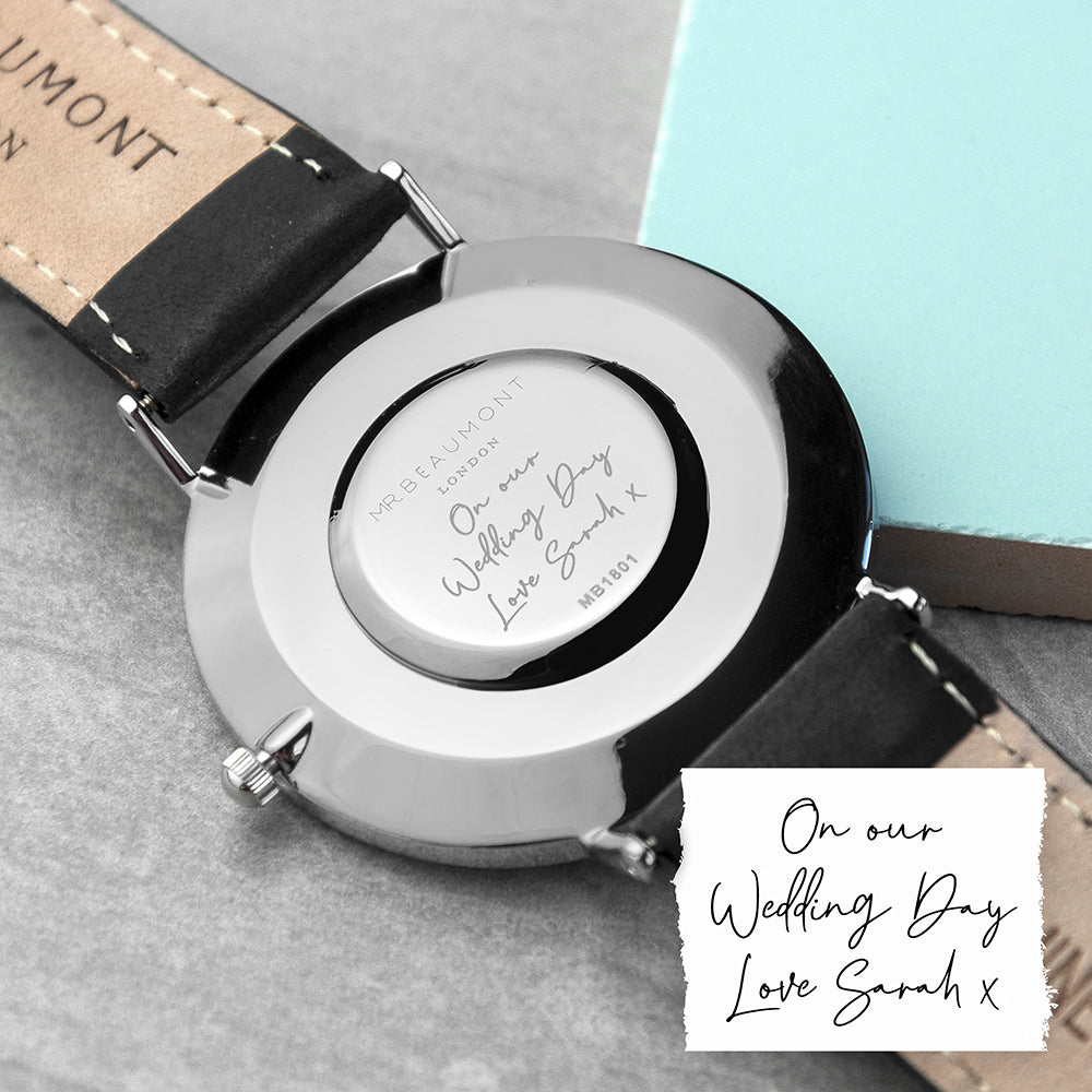 Watch with personalized message on a gray surface