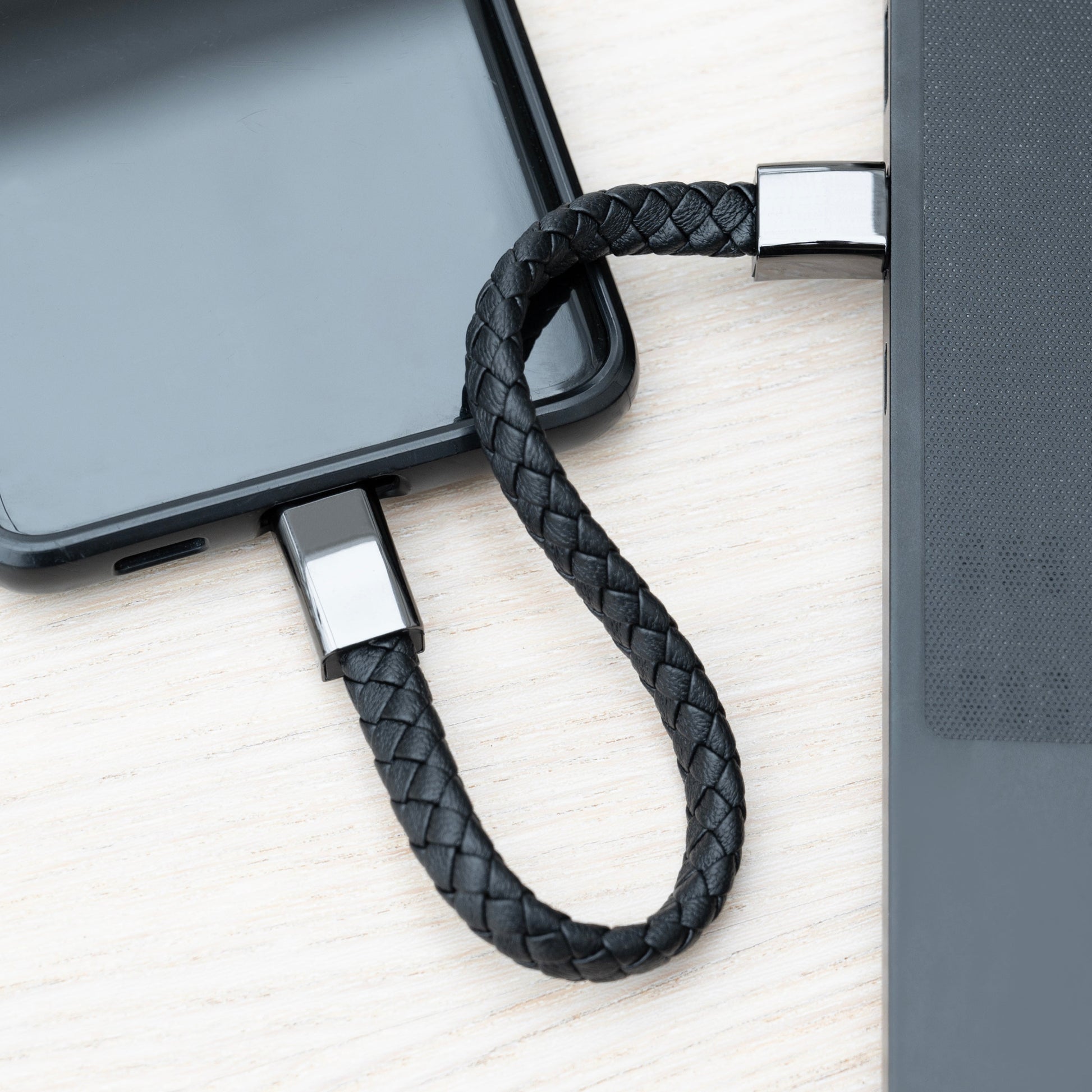 Black braided USB cable with custom branding 
