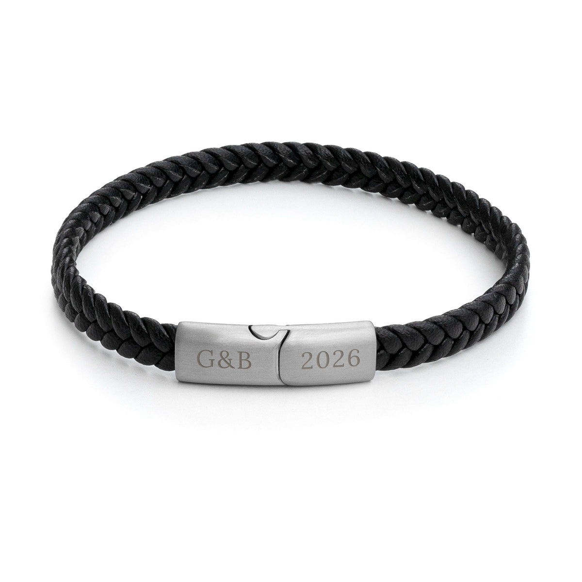 A black braided leather bracelet with a brushed silver metal clasp engraved with couple-initials and year