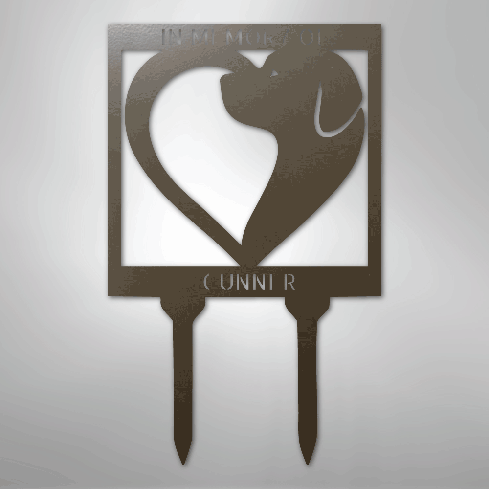 Metal garden stake with dog silhouette and heart design on a gray background