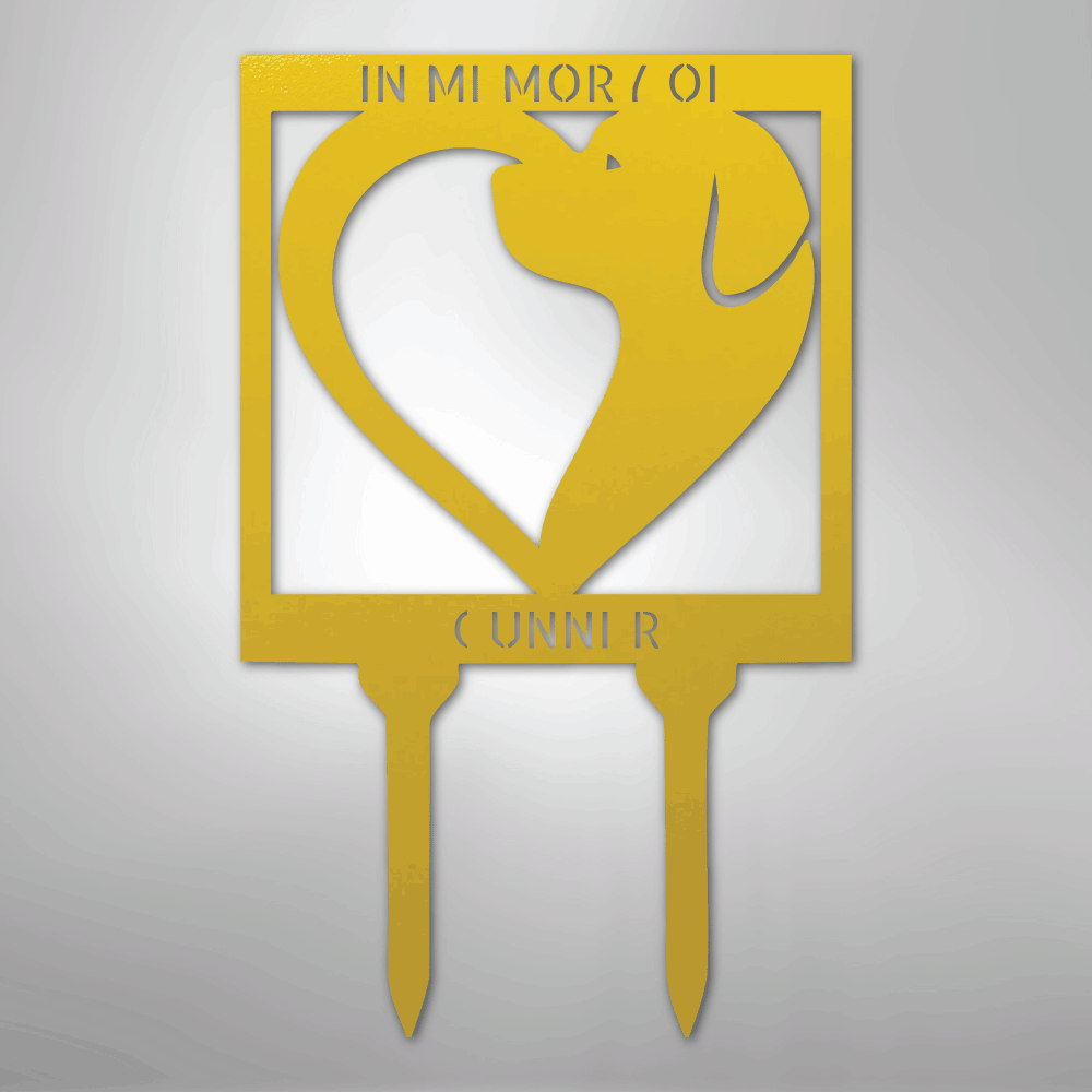 Yellow metal garden stake with a heart-shaped cutout and 'In Memory Of' text on a gray background