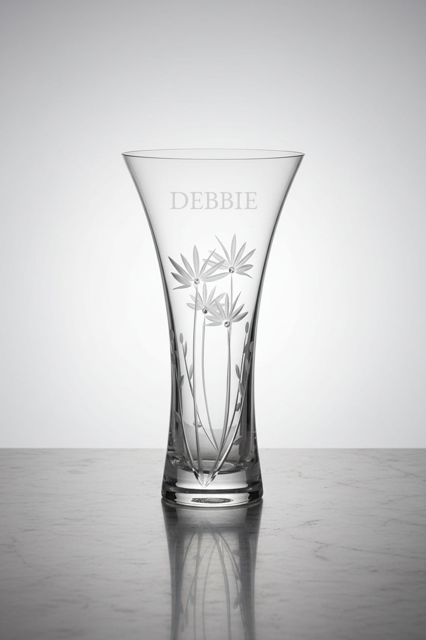 Clear glass vase with engraved floral design and name