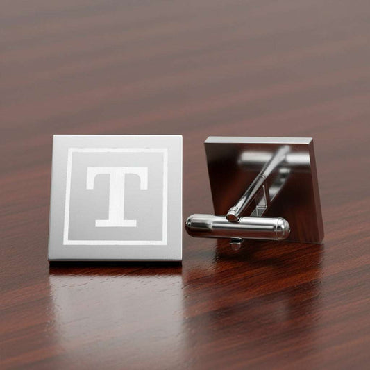 Silver cufflinks with a monogram 