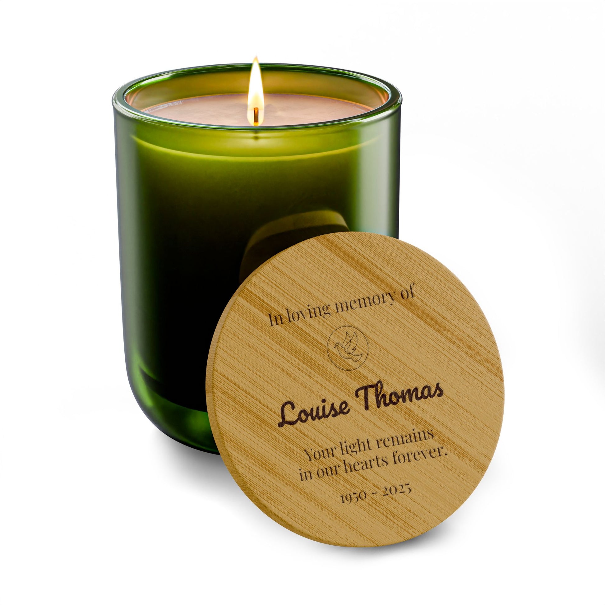 Green memorial-candle with engraved-wooden lid on a white background