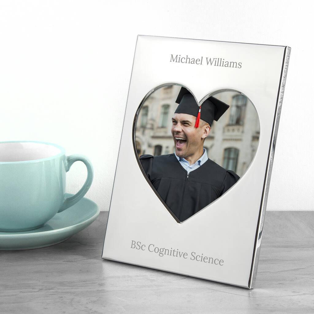 Custom-Engraved-Heart-shaped photo frame with a graduation-themed picture 