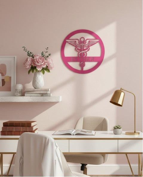 personalized pink caduceus symbol on wall
