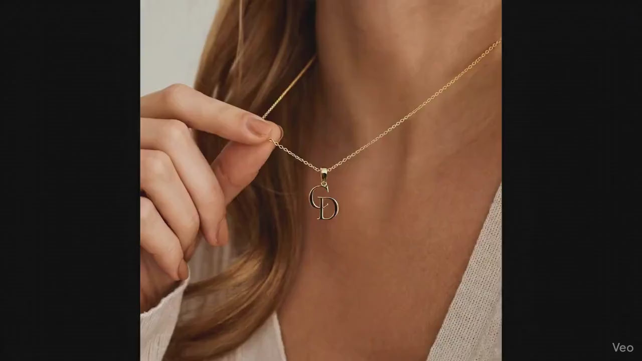 video-of-intertwined-letter-necklace