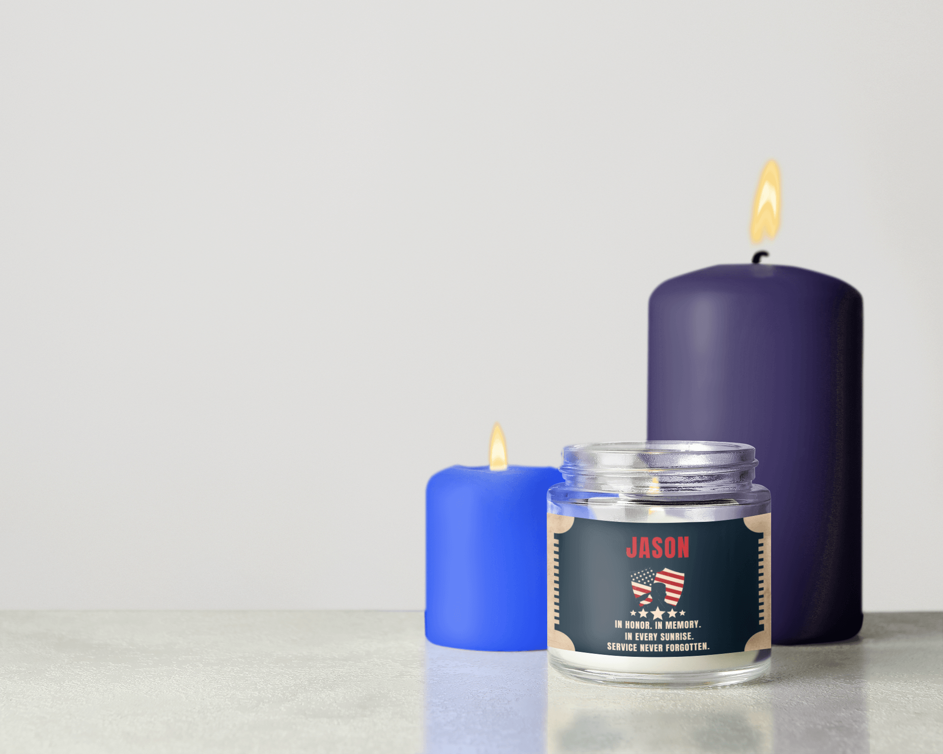 Veteran tribute candle featuring a personalized label with patriotic design and two additional decorative candles